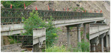 Photo. Bailey Bridge Over the Existing, Damaged Bridge. Click here for more information.