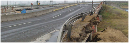 Photo. Northeast view of northern approach to Juan Pablo II bridge, facing away from Biobío River. Click here for more information.