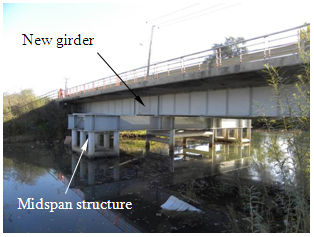 Photo. Satellite image of El Bar bridge. Click here for more information.