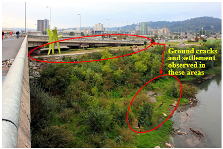 Photo. Evidence of slope instability due to liquefaction at northeast abutment and approaches of Llacolen bridge. Click here for more information.