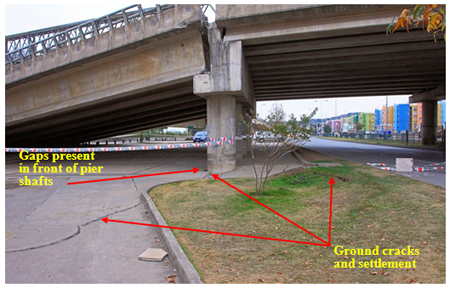 Photo. Settlement due to liquefaction-induced slope instability at northeast end of Llacolen bridge. Click here for more information.