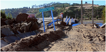 Photo. South approach fill damage and collapsed spans at Tubul Bridge. Click here for more information.