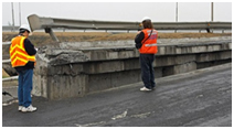 Photo. South retaining wall at Juan Pablo II. Click here for more information.
