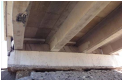 Photo. Exterior girder damage at Chada bridge, no diaphragms. Click here for more information.