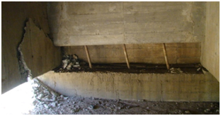 Photo. Exterior girder damage at San Nicolás bridge, partial diaphragms. Click here for more information.