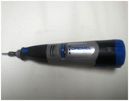 This photo shows a Dremel<sup>®</sup> high-speed tool with a rotary bit for scribing purposes. This tool has varying speeds that can be adjusted to control the rate of scribing.