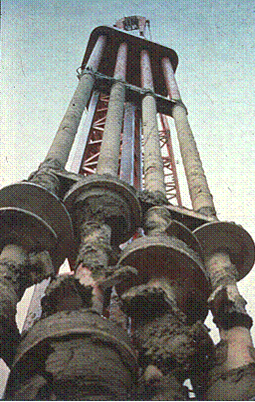 This photo shows a typical auger-based tool used for wet rotary shaft (WRS) methods. Four axis mixing shafts are shown with staggered auger flights.