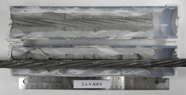 Figure 191. Photo. Stressed single-strand specimen with void and 0 percent chloride. This photo shows the as-extracted condition of a 0 percent chloride stressed single-strand specimen with void. No corrosion is visible.