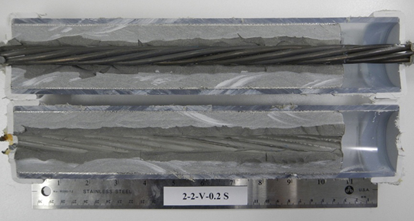 Figure 193. Photo. Stressed single-strand specimen with void and 0.2 percent chloride. This photo shows the as-extracted condition of a 0.2 percent chloride stressed single-strand specimen with void. No corrosion is visible.