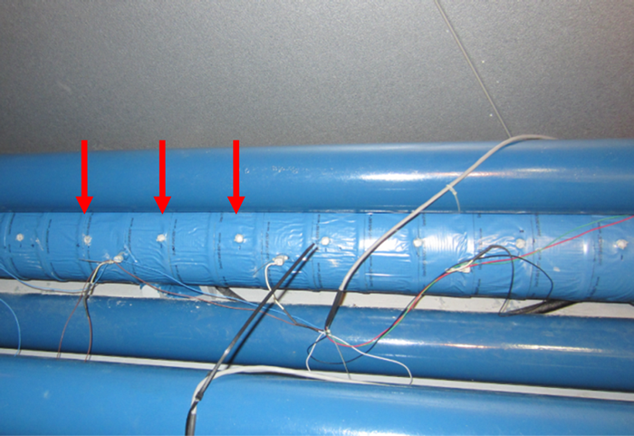 Figure 58. Photo. Drilled multi-strand specimen with 0.8 percent chloride. This photo shows a multi-strand specimen that was drilled with 24 0.5-inch holes.