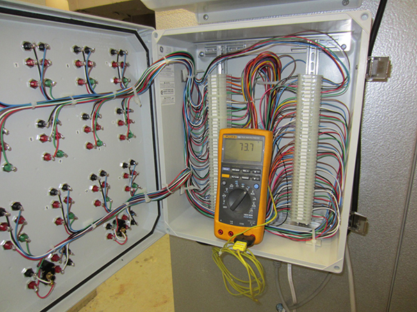 Figure 6. Photo. Data collection terminal cabinet. 
This photo shows a data collection terminal cabinet mounted on the large environmental chamber.