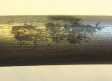 This photo shows a corroding strand removed from a voided 