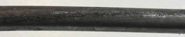 This photo shows typical crevice corrosion damage found between two stressed wires on a 0.4 percent chloride multi-strand specimen. It was determined that mean pit depth was 4.5 mil, and maximum pit depth was 8.0 mil.