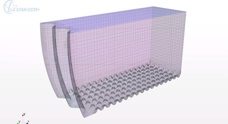 This illustration shows an oblique view of the truncated culvert model with the gravel bed surface shown in an embedded model. The use of the circular arcs results in a uniform spacing between gravel elements.