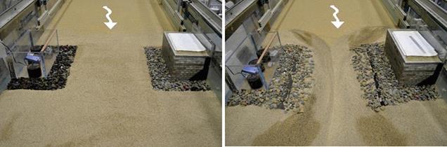 The left photo shows the actual pre-run installation in the flume. The riprap apron is placed around the base of the abutments on both sides with an apron width one-half of that used in run 1. The top of the riprap apron is flush and level with the sand bed in the contracted section and both upstream and downstream of the contracted section.  The right photo shows the post-run scour. The unprotected center has eroded more deeply than in run 1, causing rocks from the apron to fall into the extensively eroded center. The filter fabric is also partially exposed.