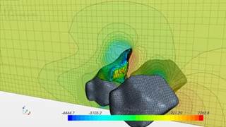 Figure 54-B. Schematic. Intermediate. Later, in the second panel, the movable rock begins to be lifted from its position as a result of the flow field. As the mesh is morphing the movable rock size is being reduced.