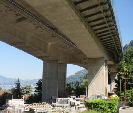 Figure 10. This figure shows a photo of the parallel post-tensioned box girder structures that compose the Chillon Viaduct.