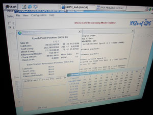 Figure 2. The Hagerstown GRIM(trademark) Software Display Photo. This photograph shows the HA-NDGPS compression algorithm's main menu screen. Information in this display includes the number of GPS satellites and their current parameters as received by the GPS receiver, the geodetic position of the receiver's antenna, and any error status.