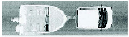 Figure 1-10. 3-D Laser Radar range image of a van pulling a boat. Photograph illustrates a three-dimensional image of a van pulling a boat as produced by a scanning laser radar.