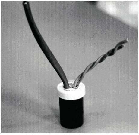 Figure 5-32. Pill bottle splice. Photograph of pill bottle splice technique.