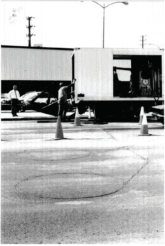 Figure 5-41. Roadway installation of round loops – completed installation. Photograph of sealed sawcut with excess sealant removed. 