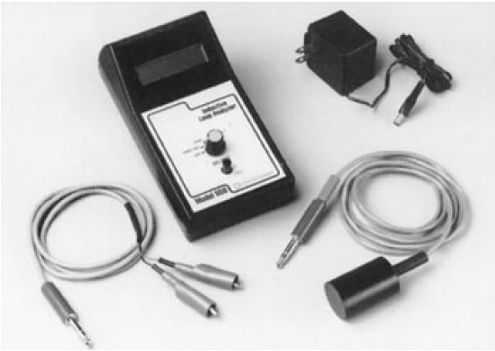Figure 6-2. Model ILA-550 inductive loop system analyzer. Photograph showing the power supply, cables, and analyzer unit that make up this commercial inductive loop system analyzer. 