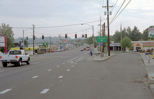 Figure 79. Another example of a jughandle intersection. Photo. This jughandle veers slightly to the right and ties back into the major intersection, which is a T-intersection to the left. There is no intersecting cross street to the right.