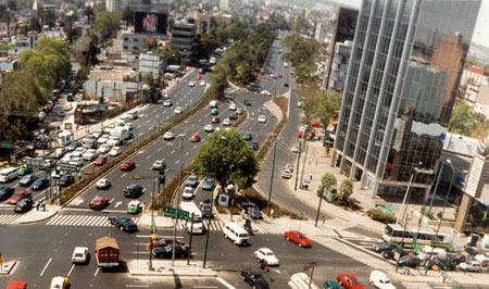 Figure 94. Displaced left turn at a continuous flow intersection. Photo. The picture shows an example of the displaced left turn at a continuous flow intersection in an urban setting.