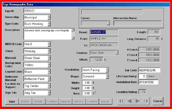 This screen shot of a window in a computer application shows information collected as part of the New Mexico Road Feature Inventory (RFI), an extensive database on its entire roadway system. The screen is titled “Sign Demographic Data,” and it contains several dropdown menus and text boxes for data entry to characterize assets such as materials, colors, location, size, and orientation.