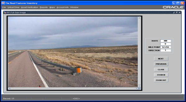  This photograph collected as part of the New Mexico RFI shows an Interstate sign beside the roadway outside of Santa Fe. The photo was taken from a vehicle traveling in the right lane of a two-lane highway.