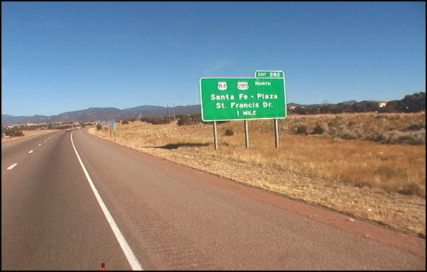 This screenshot shows a window of information in the Road Features Inventory application. On the left of the screen is a hierarchical tree with the subcategory “guardrail” highlighted. To the right of the hierarchical tree is a box containing detailed route characteristics and data about the image of the guardrail shown in figure 5. The image of the guardrail appears in a small box in the middle of the screen.