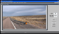 A photo on a computer screen of a guardrail in New Mexico
