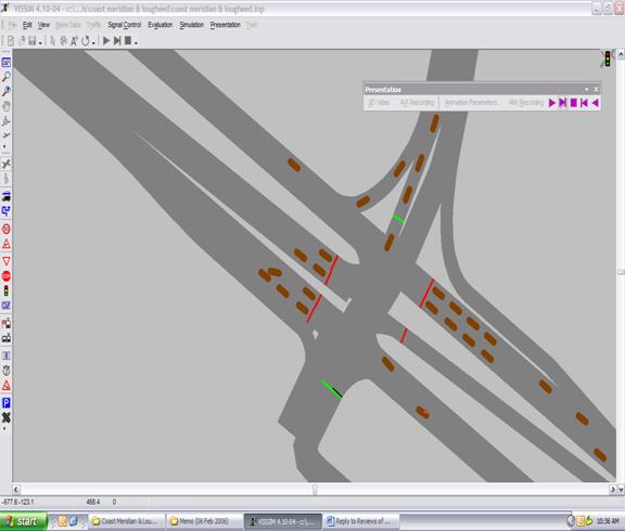 Figure 247. Screen Capture. Third Vehicle Crashing into Second Vehicle. This is a screen capture from a running VISSIM simulation. Two vehicles stop at the red light on the eastbound approach, with three more vehicles (referred to as the first vehicle, the second vehicle, and the third vehicle) stop behind. The first vehicle has come to a complete stop, while the second vehicle has changed lanes and stopped diagonally. The third vehicle fails to recognize the presence of the second vehicle and crashes.