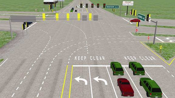  This is a scene from the driving simulation for the low treatment. The picture is similar to figures 8 and 9, except this picture shows only one stop line that spans both the left-turn lanes and the through lanes. Also, the STOP HERE signs and the poles that were mounted in the previous figures are not present in this picture.