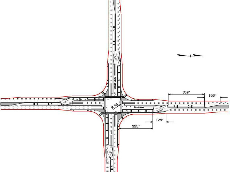 The illustration shows a typical full displaced left-turn (DLT) intersection plan view with DLTs on all approaches. The graphic also provides measurements.