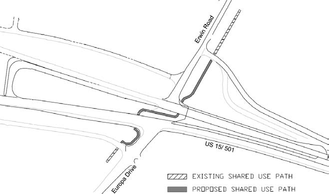 The illustration depicts a restricted crossing U-turn (RCUT) intersection with minor street approaches offset to produce shorter pedestrian crossings.