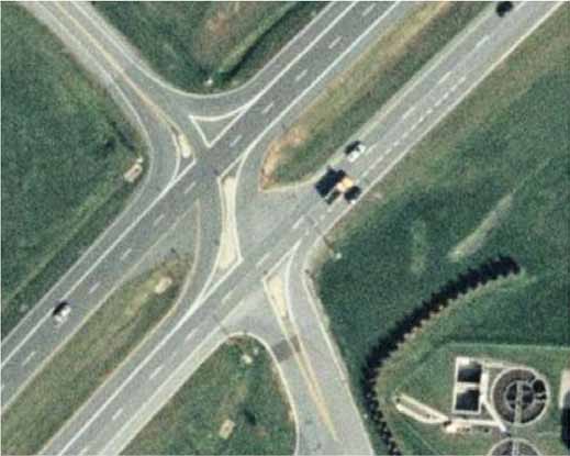 The photo shows a restricted crossing U-turn (RCUT) intersection at Route 15 in Emmitsburg, MD.