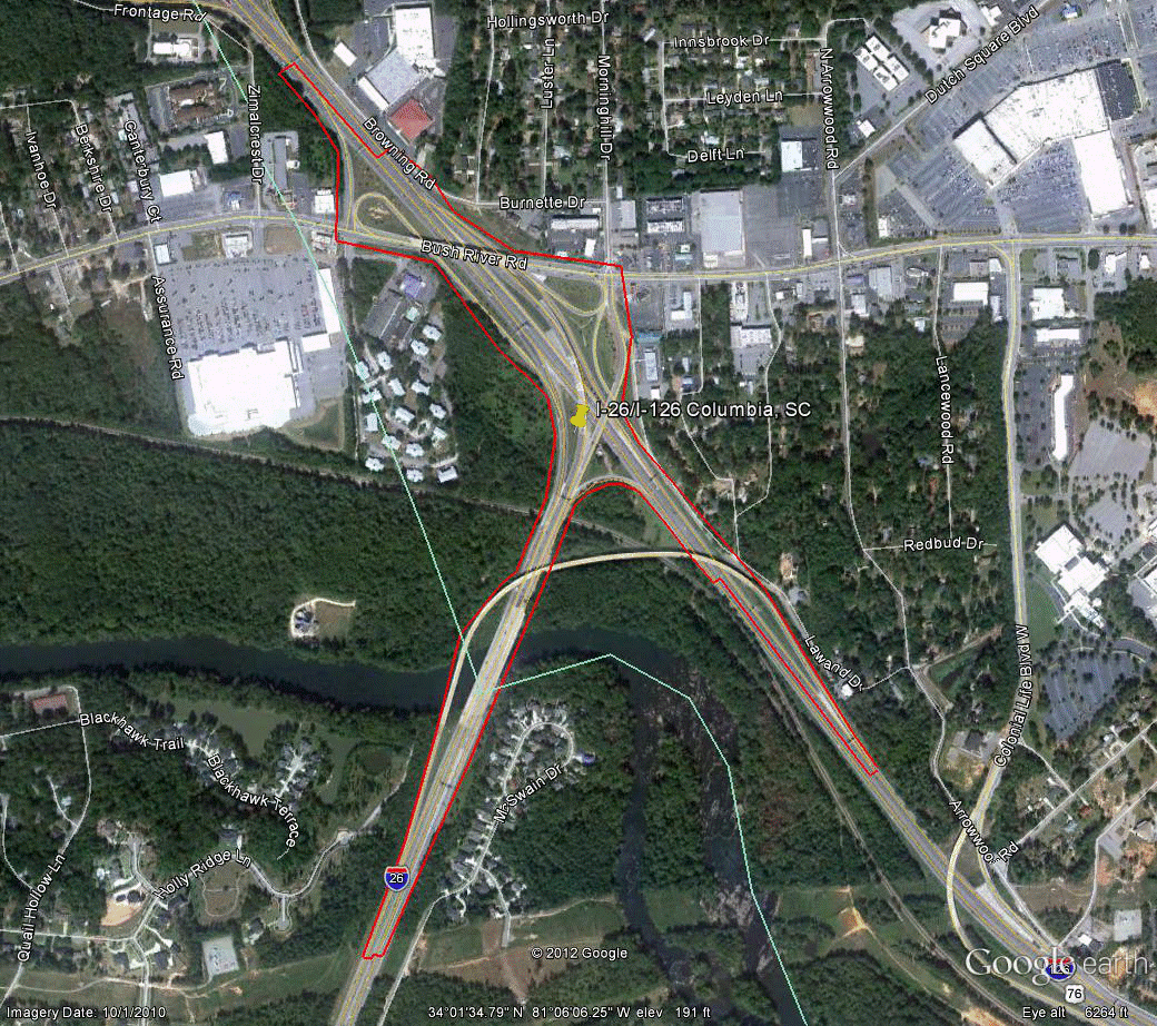 Figure 102. Photo. Aerial view of site SC-1. This figure shows an aerial photo of the interchange of I-26/US-76 with I-126, US-76, and Bush River Road in Columbia, SC. The study limits along each route were drawn on the aerial photograph.