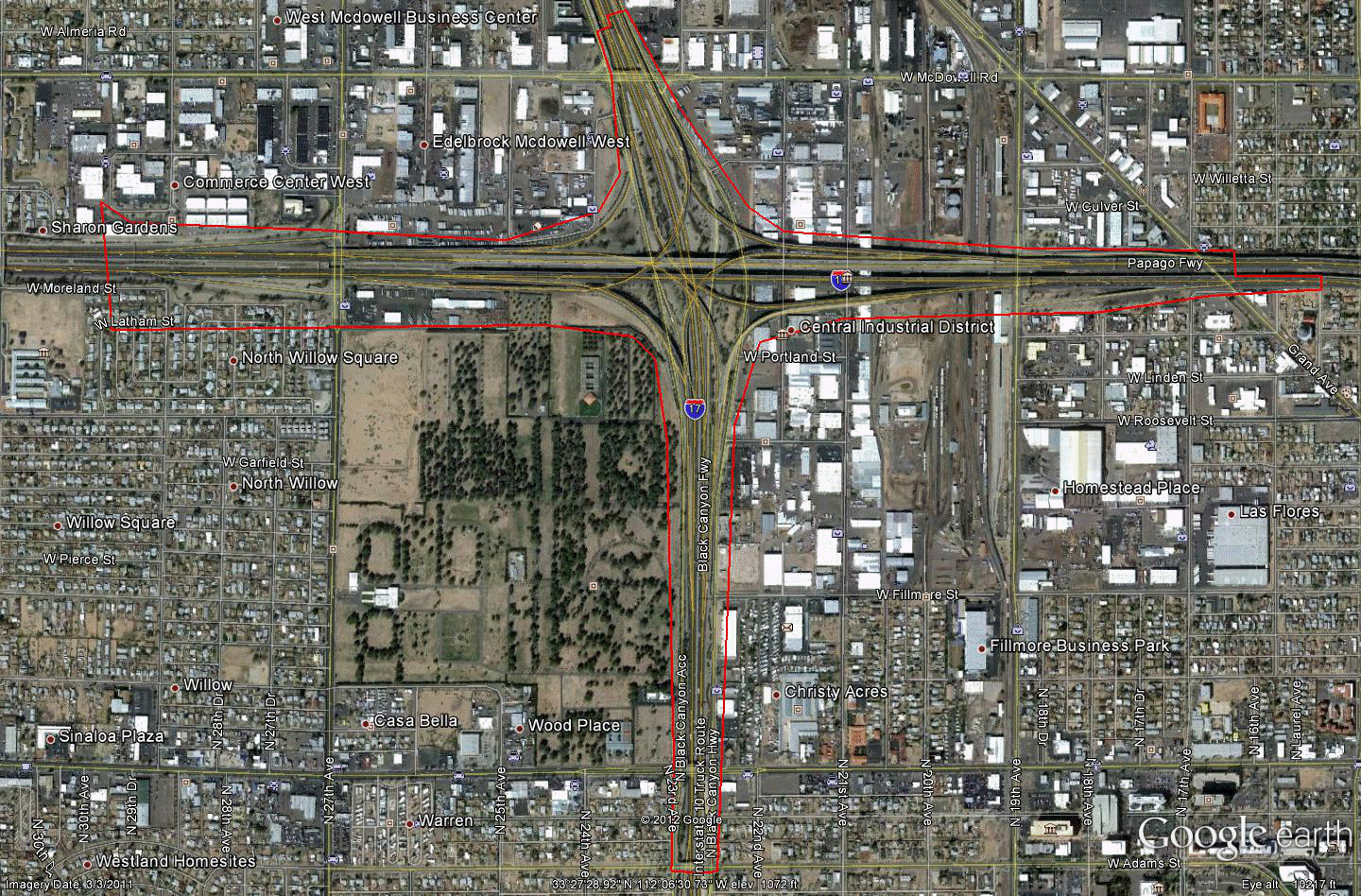 Figure 80. Photo. Aerial view of site AZ-1. This figure shows an aerial photo of the interchange of I-10 with I-17/US-60 in Phoenix, AZ. The study limits along each route were drawn on the aerial photograph. 