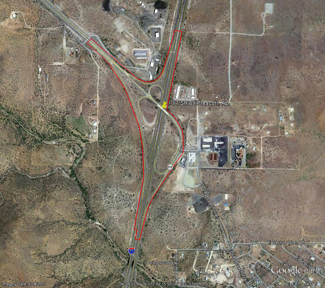 Figure 82. Photo. Aerial view of site AZ-3. This figure shows an aerial photo of the interchange of I-17 with SR 69 in Prescott, AZ. The study limits along each route were drawn on the aerial photograph.