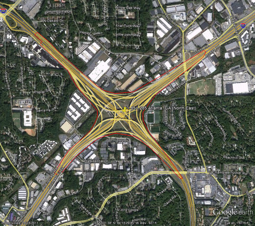 Figure 86. Photo. Aerial view of site GA-2. This figure shows an aerial photo of the interchange of I-85/SR 403 with I-285 in Atlanta, GA. The study limits along each route were drawn on the aerial photograph.