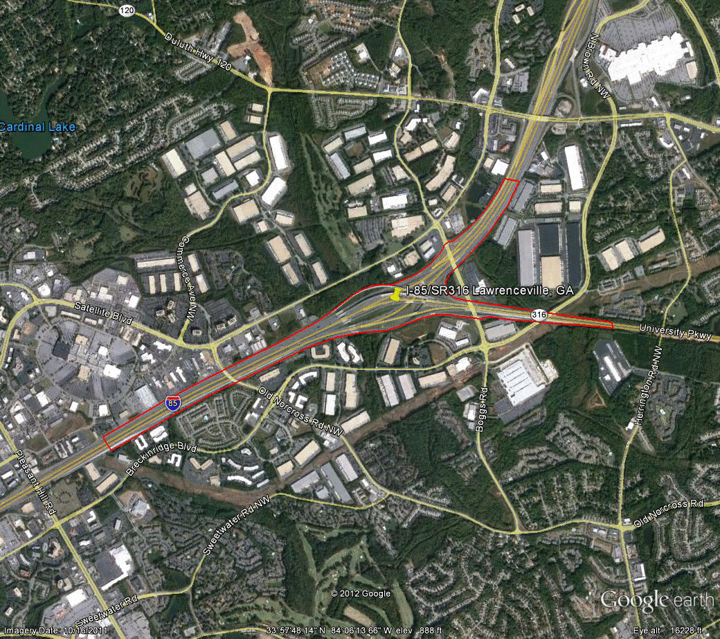 Figure 87. Photo. Aerial view of site GA-3. This figure shows an aerial photo of the interchange of I-85/SR 403 with SR 316 in Atlanta, GA. The study limits along each route were drawn on the aerial photograph.