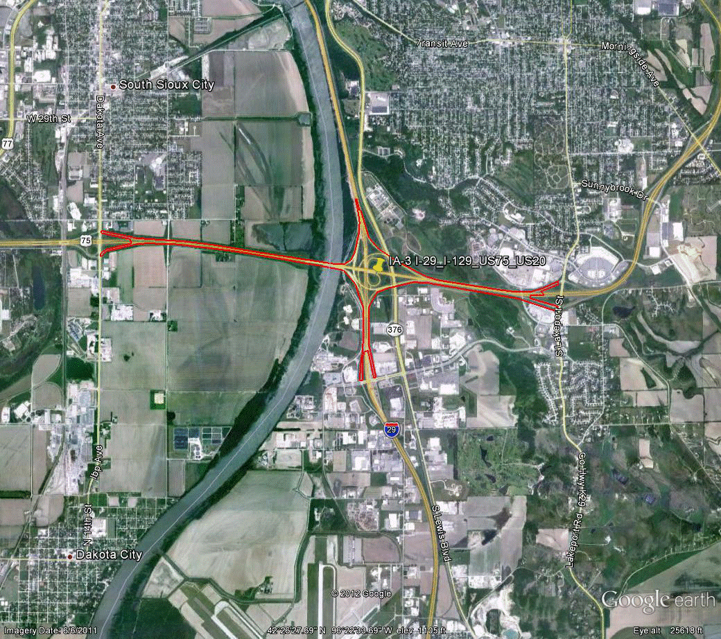 Figure 93. Photo. Aerial view of site IA-3. This figure shows an aerial photo of the interchange of I-29 with I-129 and US-75/US-20 in Sioux Falls, IA. The study limits along each route were drawn on the aerial photograph.