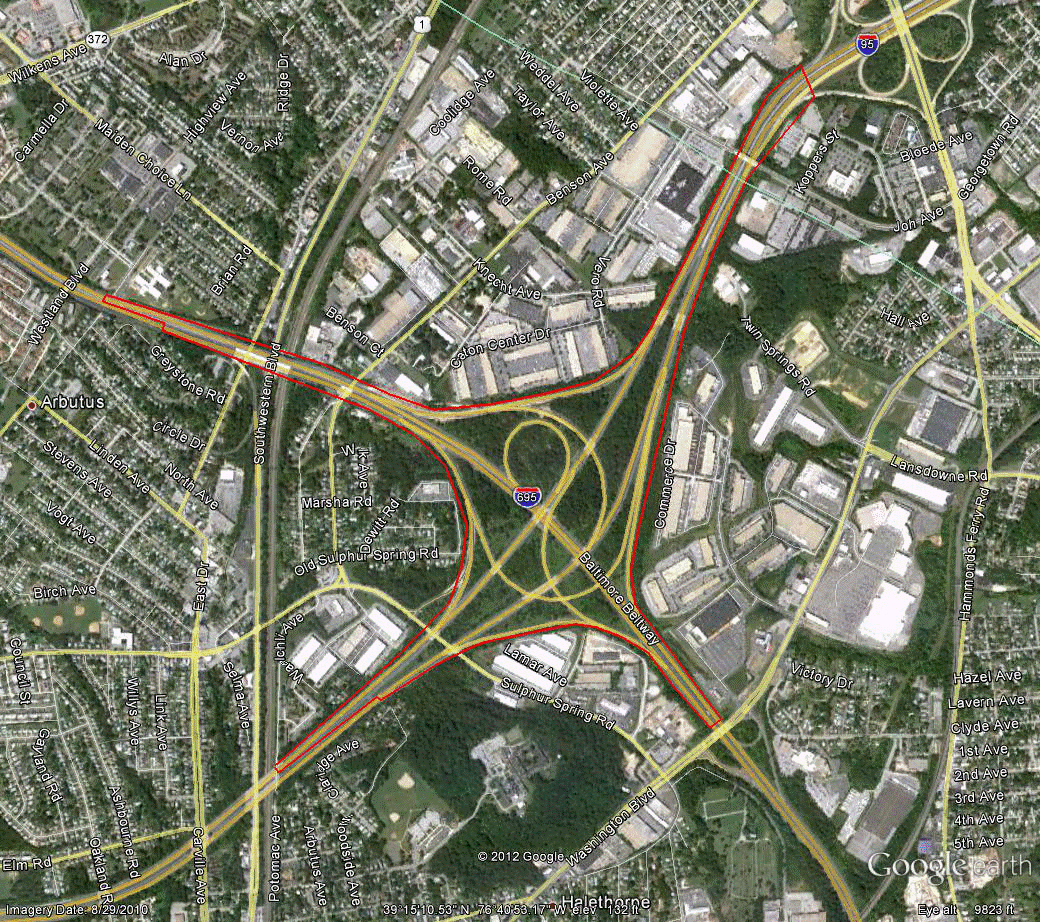 Figure 94. Photo. Aerial view of site MD-1. This figure shows an aerial photo of the interchange of I-95 with I-695 in Baltimore, MD. The study limits along each route were drawn on the aerial photograph.