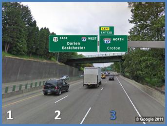 This photo shows an example test slide from topic 3 depicting lane 3 to left exit. There is a three-lane single direction highway with the lanes labeled 1 through 3 from left to right, with number 3 highlighted in blue. There are two signs spanning the three lanes. The sign on the left is over lanes 1 and 2. There are two rows of text. The top left is labeled  19 East,  and the top right is labeled  33 West.  Below and between those two labels is  Darien Eastchester.  The second sign is over lane 3 and is labeled  112 North Croton.  There is an extension on the top left that is labeled  Left Exit 138  with  left  in yellow.