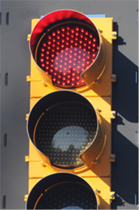 The figure shows a signal head with light-emitting diode (LED) bulbs for comparison with the incandescent signal head shown in Figure 1.