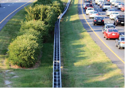 Figure 36. Photo. Barrier type 10—median barrier steel guardrail.(15)