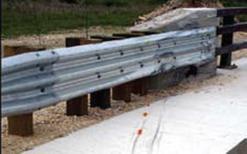 Figure 50. Photo. Barrier end treatment type 2—guardrail bridge attachment.(14)