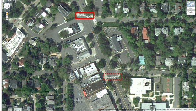 Aerial view of Location 8. The solid red rectangle highlights the intersection of Oliver Street Northwest and Connecticut Avenue Northwest. The dotted red rectangle highlights the intersection of Northampton Street Northwest and Connecticut Northwest in Washington, DC. The District of Columbia Department of Transportation camera was positioned facing south and captured pedestrians crossing east/west on Connecticut Avenue Northwest between Oliver Street Northwest and Northampton Street Northwest. The aerial view presents a mix of mostly residential homes and some commercial space. 