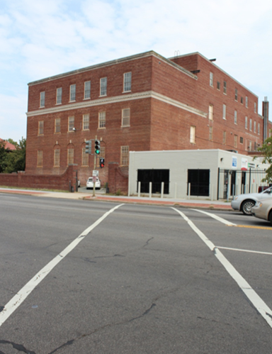 Illustration of what a pedestrian might see as he or she attempts to cross from the west side of Georgia Avenue Northwest to the east side of the street along Arkansas Avenue Northwest. The photograph is taken from the pedestrian perspective.